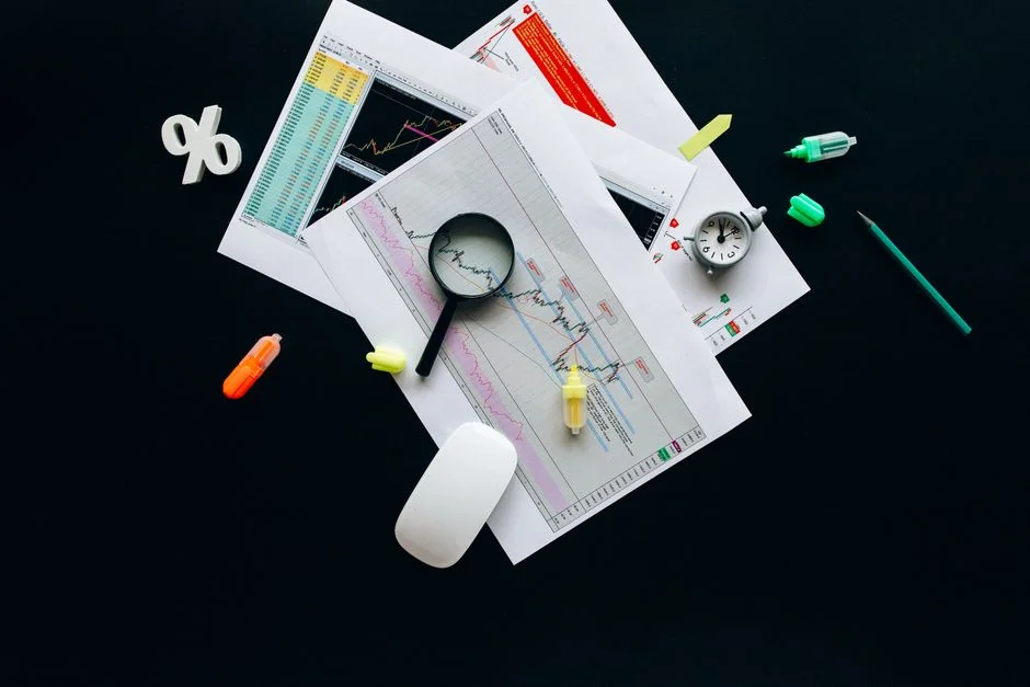 Sticky notes with holiday marketing ideas clipped to a wall grid.